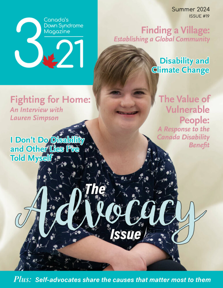 3.21 Magazine cover featuring white, blonde-haired woman with Down syndrome wearing flowered navy top, smiling in front of cream background