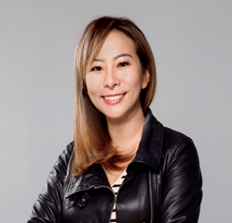 headshot of east Asian woman with shoulder length dark hair with blonde highlights and black top